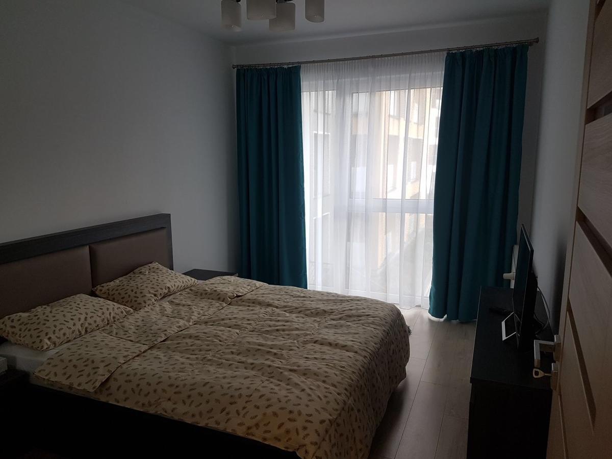 Hotel Platinia Kluž Exteriér fotografie A bedroom in a typical apartment